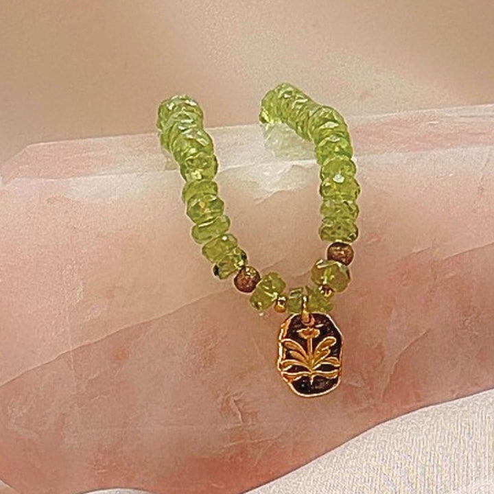 Bloom Within Peridot Necklace