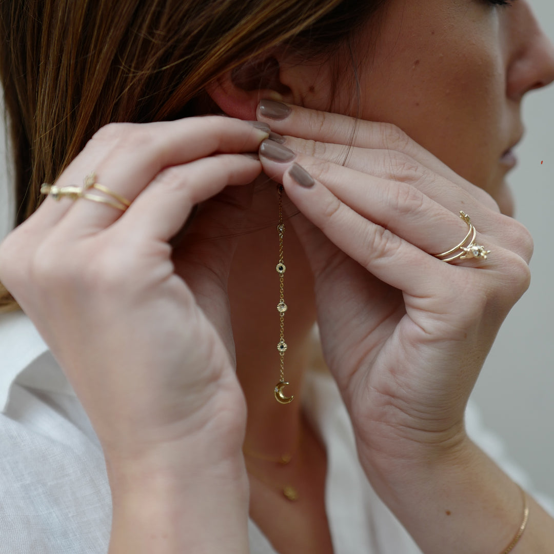 Boucle d'oreille Swing en or et émeraude