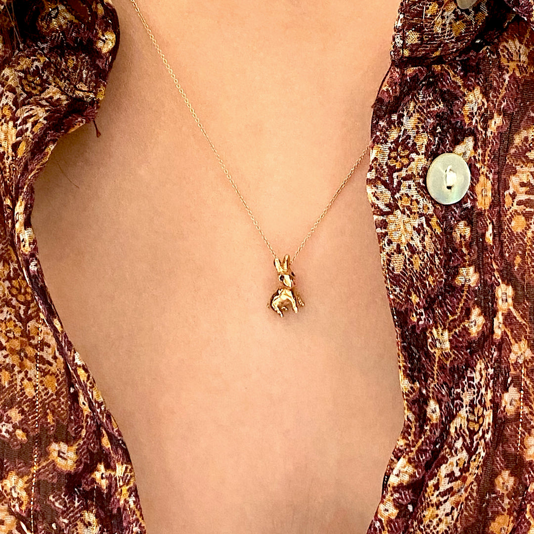 Gold & Emeralds Running Illusion  Charm