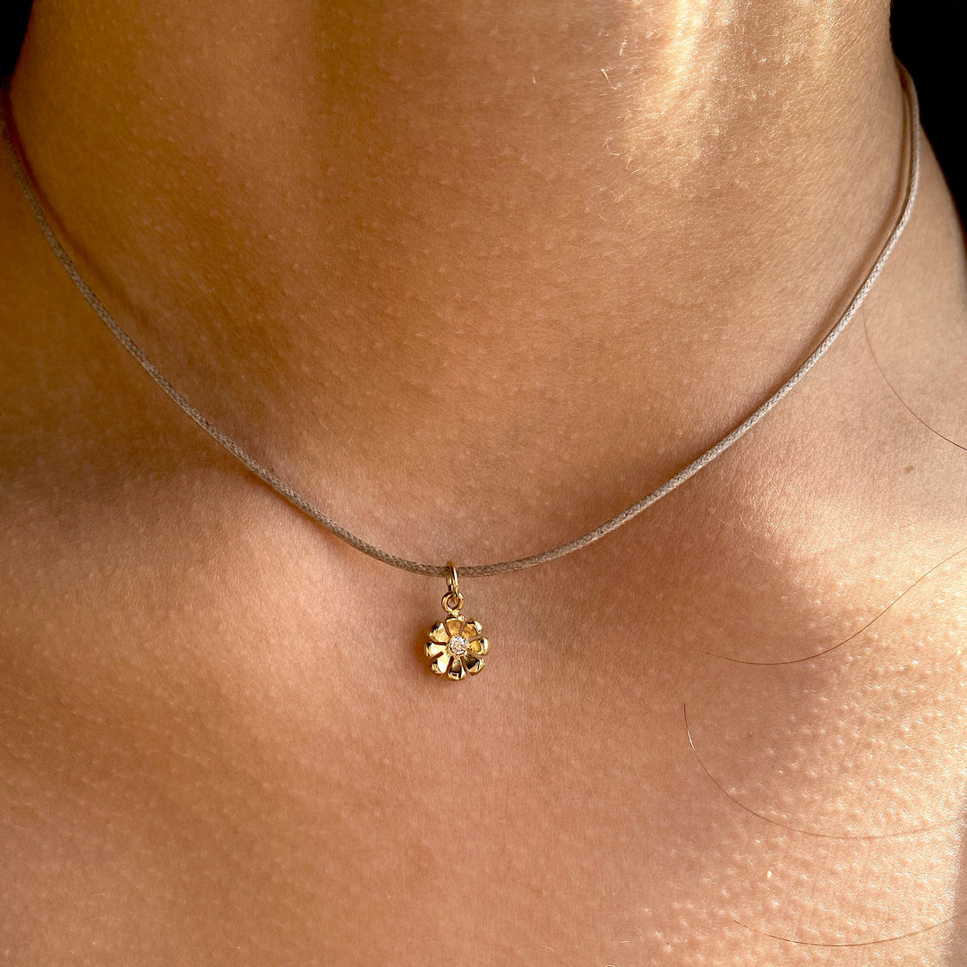 Gold & Ruby Daisy Charm