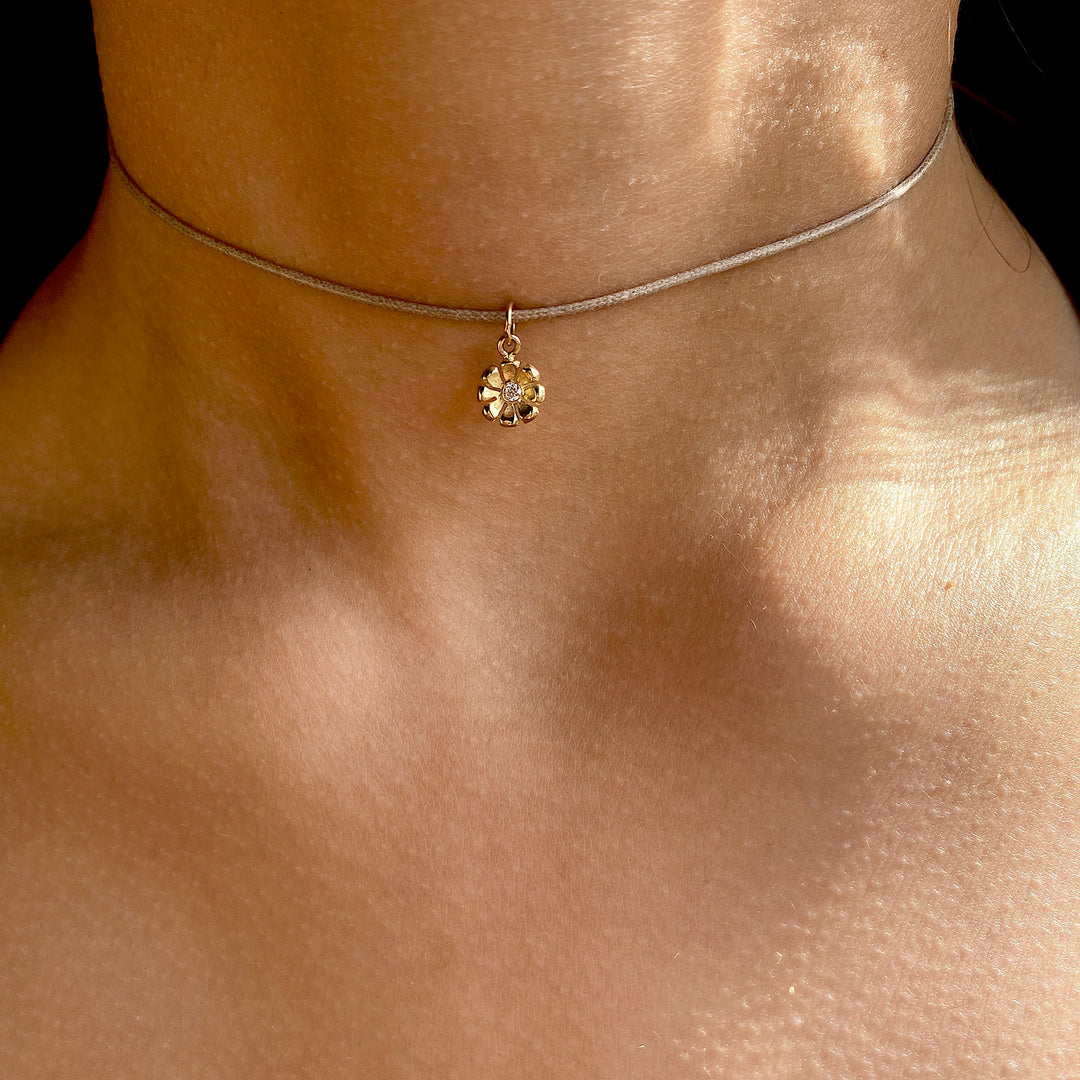 Gold & Ruby Daisy Charm
